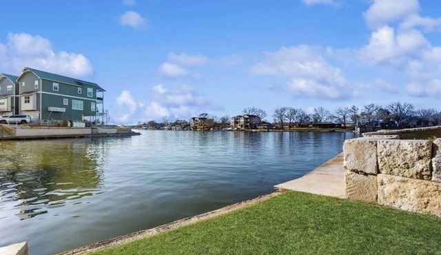 Stunning lakefront home w/pickleball, shared pool & sand volleyball