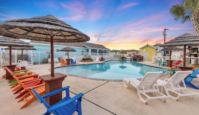 Stylishly decorated condo in Pirates Bay! Community pool and outdoor grilling ar