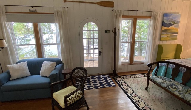 The Wee White Cottage on Tripp Lake in Poland, Maine.