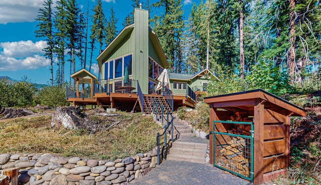 Unique riverfront home + cabin with amazing views, deck, & W/D - dog-friendly
