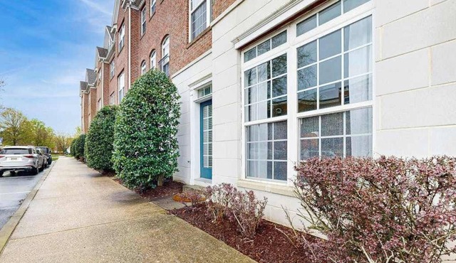 Village of Five Points townhouse with community pool, gym, and tennis access