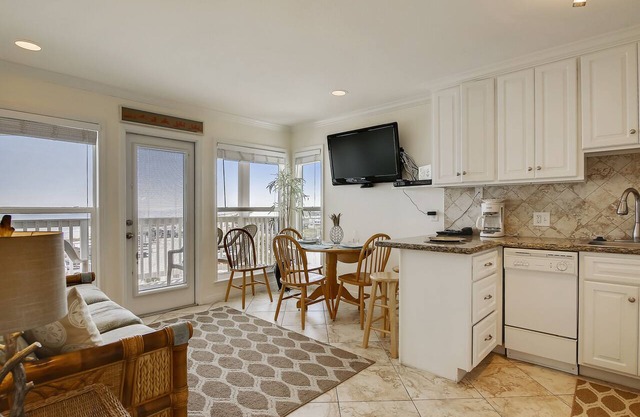 Beach Cottage steps from Surf. fishing. the Beach and Serene Sunsets (1303)