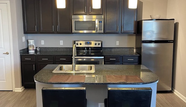 Right at Polaris! 3rd floor w/elevator access and garage parking included!